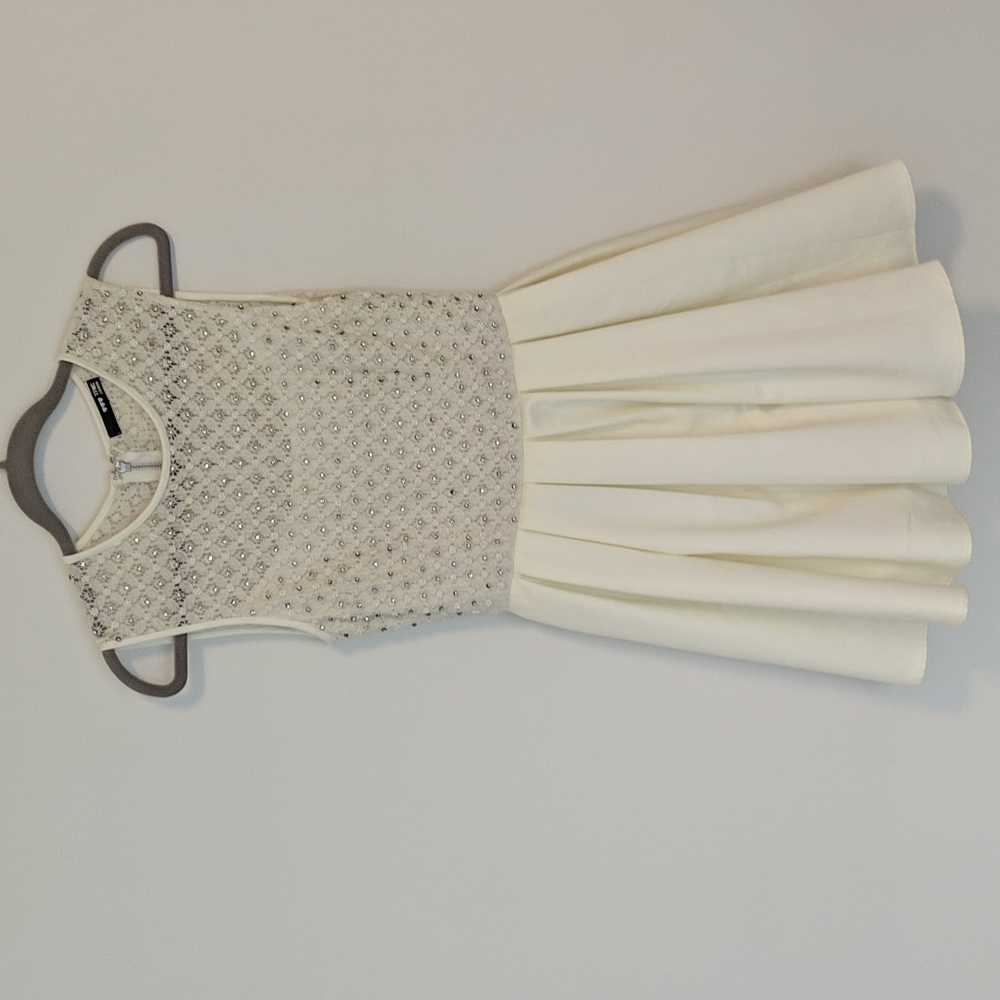 TFNC London cream dress with sparkly top and pleated skirt. Size S.